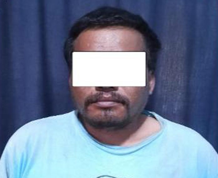 Arrested defendant Sher Bahadur Nepali